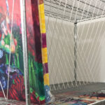 Idea of a shelf storage to organize paintings